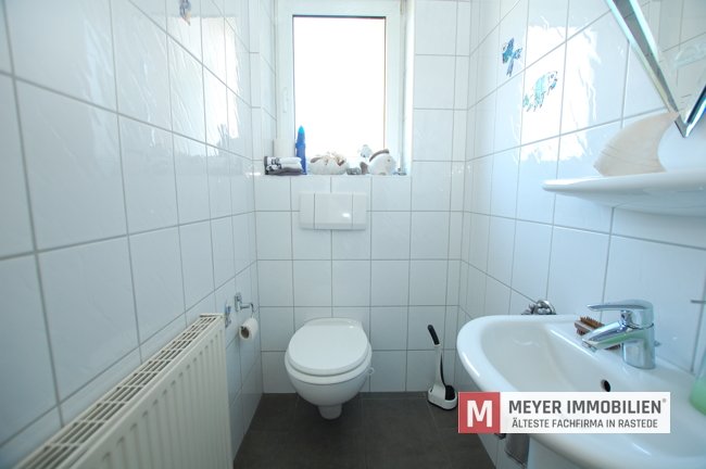 Interessantes Doppelhaus (2 WE) auf einem Traumgrundstück im Ortskern von Wiefelstede (Obj.-Nr.: 6499)