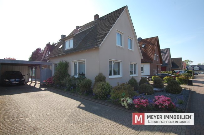 Interessantes Doppelhaus (2 WE) auf einem Traumgrundstück im Ortskern von Wiefelstede (Obj.-Nr.: 6499)