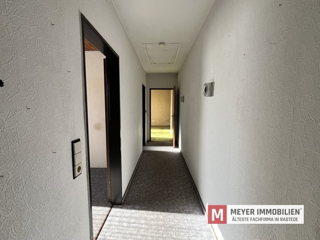 Wohnen auf einer Ebene – Bungalow mit herrlichem Garten und 3 Garagenstellplätzen (Obj.-Nr. 6540)