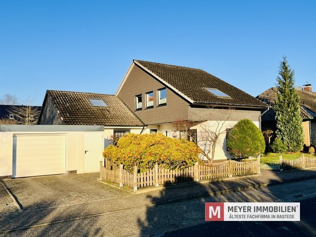 Gepflegtes Einfamilienhaus mit Wintergarten und Teichanlage! (Obj.-Nr. 6584)