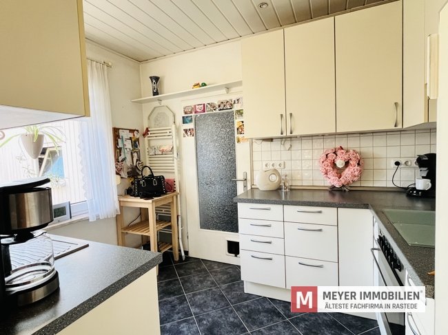 Gepflegtes Einfamilienhaus mit Wintergarten und Teichanlage! (Obj.-Nr. 6584)