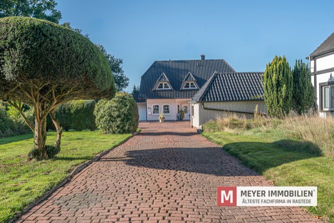 Familienfreundliches Einfamilienhaus mit separater Gewerbefläche in Jaderberg (Obj.-Nr. 6536)