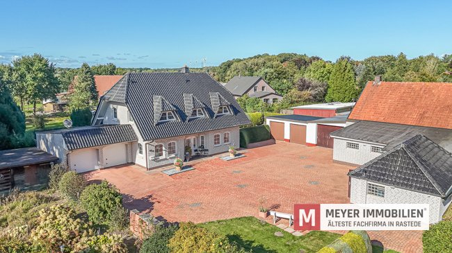 Familienfreundliches Einfamilienhaus mit separater Gewerbefläche in Jaderberg (Obj.-Nr. 6536) 
